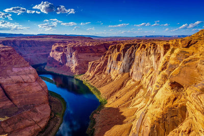 Grand Canyon river golden rock face