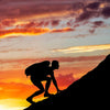 “Keep Climbing” Climber Moving up Mountain Slope Is a Great Motivational Shot
