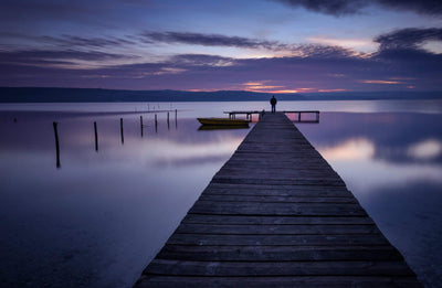 Long bridge over calm lake