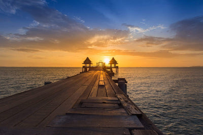 Planked dock over ocean