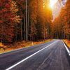 Road at Fall with Sunset in Mountains