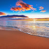 Sunset Over sandy brown beach
