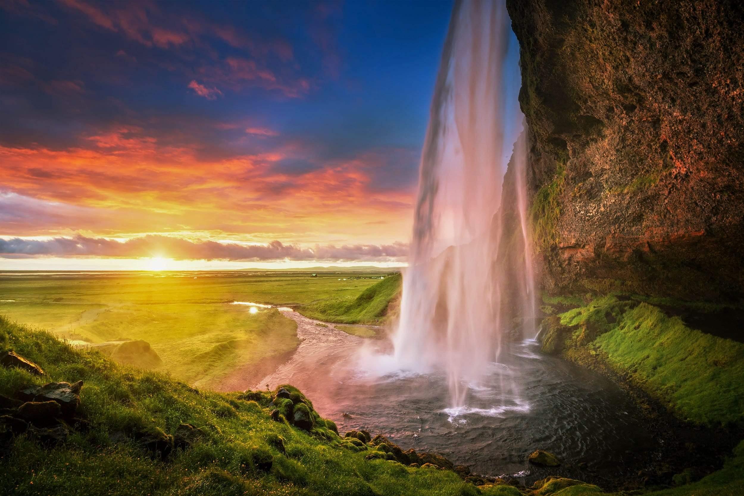 Waterfall flowing into River Sunset